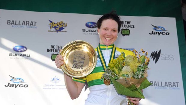 Reason to celebrate: Sarah Roy with the trophy for her first national championship in the women's criterium at Ballarat. <i>Photo: Justin Whitelock</i>