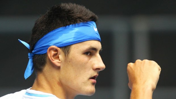 Tomic starts well.