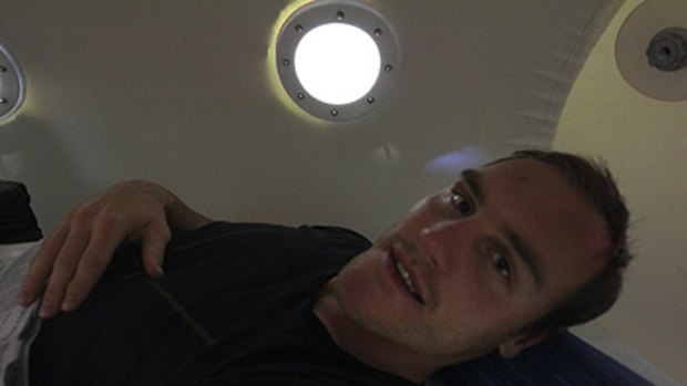 Wests Tigers forward Gareth Ellis tries out the hyperbaric chamber.