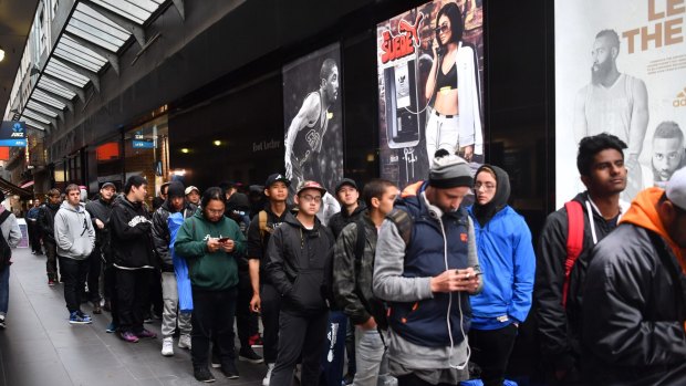 People line up for limited edition runners. Opening of Foot Locker, Bourke st Mall Melbourne. Runners, Speakers , joggers , Jordan, Adidas ,Puma. 13th April 2017 Fairfax Media The Age news Picture by Joe Armao