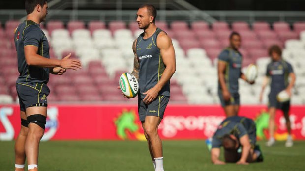 In search of balance: Rob Simmons and Quade Cooper at Ballymore on Monday.