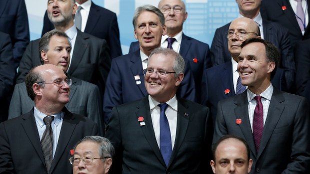 Treasurer Scott Morrison participates in G-20 family photo during IMF/World Bank annual meetings in Washington.