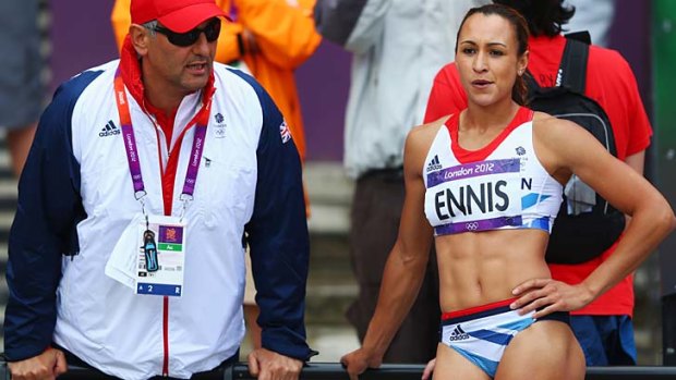 Looking for answers ... Jessica Ennis listens to her coach Toni Minichiello.