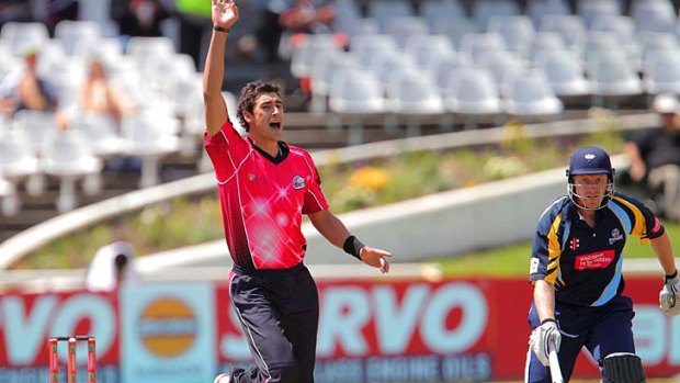 Potential No.1 ... Mitchell Starc of the Sydney Sixers celebrates taking a wicket against Yorkshire.