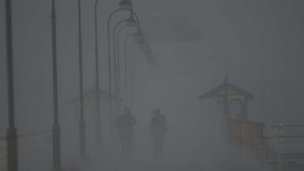 WeaDramatic weather on St Kilda Pier at 3.42pm Thursday afternoon.