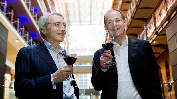 Pernot Ricard executives Pierre Pringuet and Jean-Christophe Coutures sample the product.