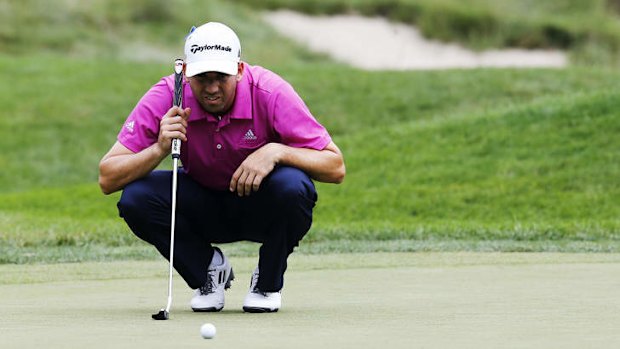 One of life's most humbling experiences: Sergio Garcia lines up a putt.