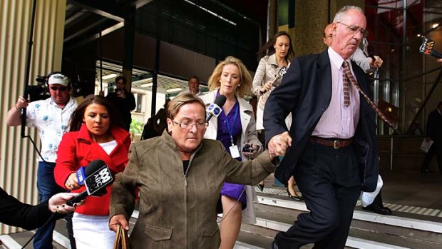 After the sentencing ... Keli Lane's parents Sandra Lane, third from left in the brown jacket, and Robert Lane, right, leave the Supreme Court.