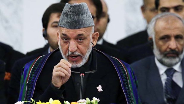 Despised by the Taliban for being "corrupt and weak" ... Afghan President Hamid Karzai.