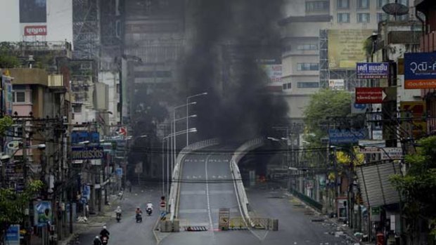 Smoke rises from burning tyres in Bangkok