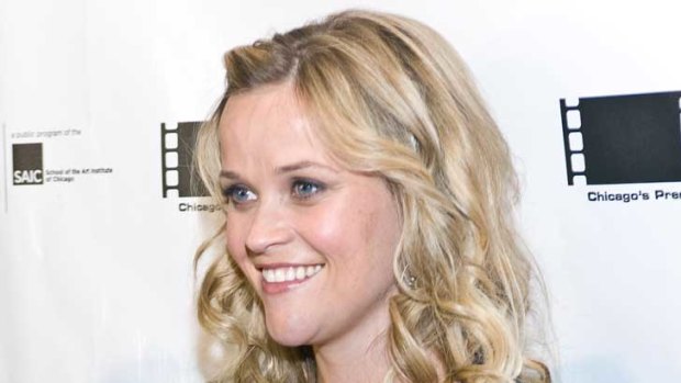 Out in the open ... Reese Witherspoon can't keep her bump a secret any longer.