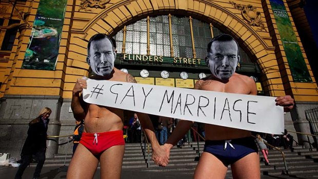 Pro-gay marriage advocates draw attention to Tony Abbott's anti- same sex marriage stance.