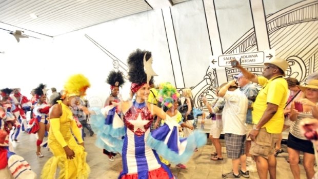 Cuban dancers perform to welcome passengers of the Adonia on Monday.