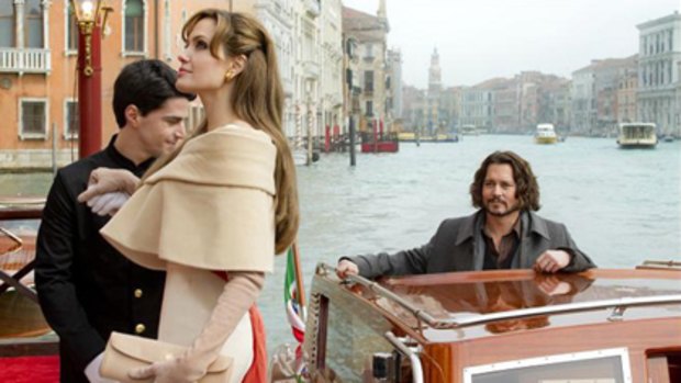 Neighbours now friends ... Angelina Jolie and Johnny Depp co-star in The Tourist.