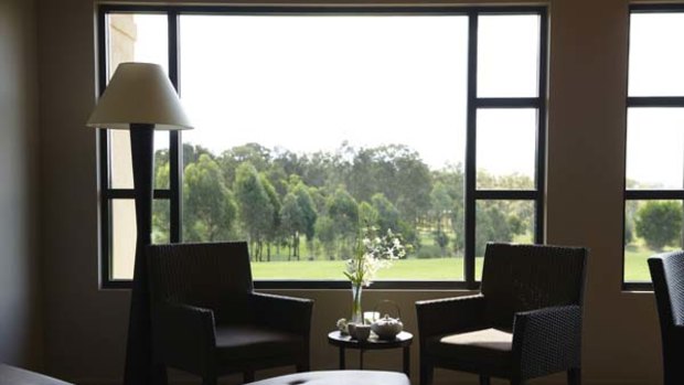Tee time ... a lounge in Chateau Elan's spa overlooks the Vintage course.