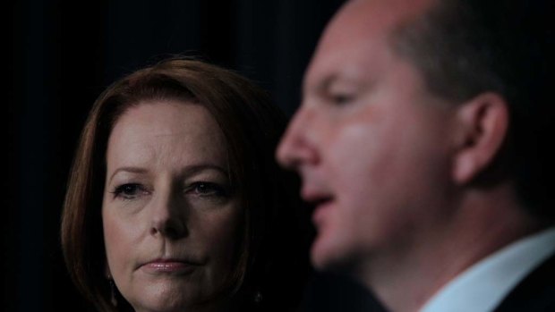 Prime Minister Julia Gillard and Immigration Minister Chris Bowen announcing the now failed Malaysia solution. Labor has changed its party platform to allow offshore processing of asylum seekers.