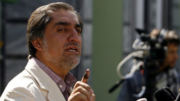 Afghan presidential candidate Abdullah Abdullah speaks during a news conference in Kabul.