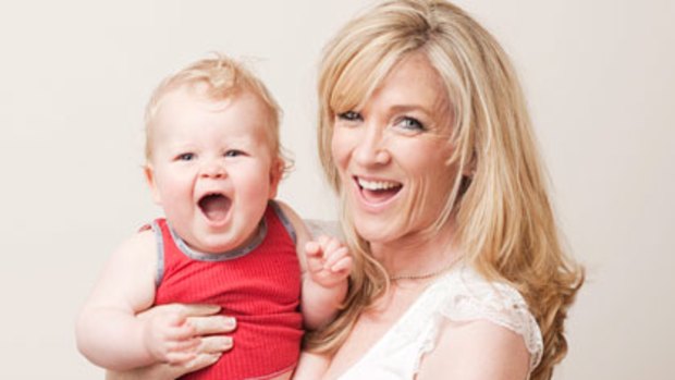 TV newsreader Jacinta Tynan at home with her son Jasper Timms, 11 months.