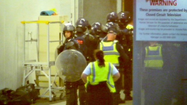 Riot police and dog handlers were called to the Parkville centre last November.