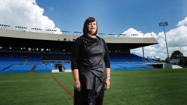 ""The excitement in the streets of Belmore last night and today really highlights how much the Bulldogs mean to this community.": Raelene Castle standing at Belmore Oval. 