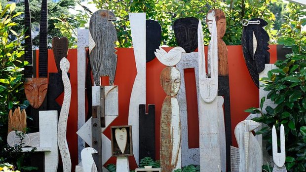 Sculpture can provide a great focal point or disguise a boring fence.