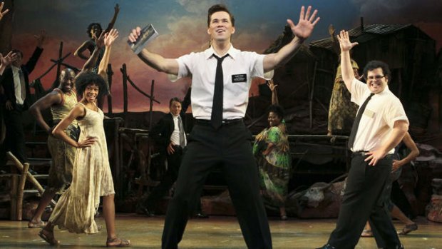 Rema Webb, Andrew Rannells and Josh Gad in the musical <i>The Book of Mormon</i>. Songs from the musical are popular at Marie's Crisis, a piano bar that is coming to Sydney as part of Spectrum Now.