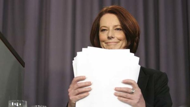 Prime Minister Julia Gillard addresses the National Press Club to announce a controversial levy to help pay for the floods.