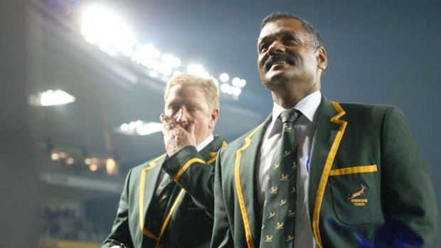 Things can only get better . . . Springboks coach Peter De Villiers (R) leaves the field with assistant coach Dick Muir after All Blacks Test in Auckland.