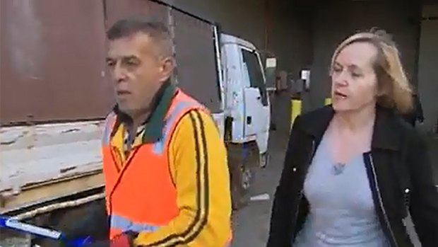 'Captain Emad' is confronted by ABC reporter Sarah Ferguson in Gungahlin.
