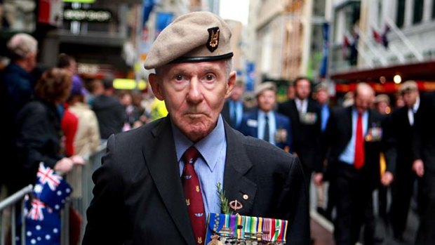 Flying the flag... a veteran displays his medals.