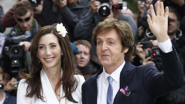 Getting hitched ... Paul McCartney and bride Nancy Shevell arrive for their marriage ceremony at Old Marylebone Town Hall in London.