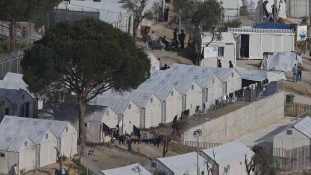 Migrants and refugees inside Moria camp on the Greek island of Lesbos, on Sunday.