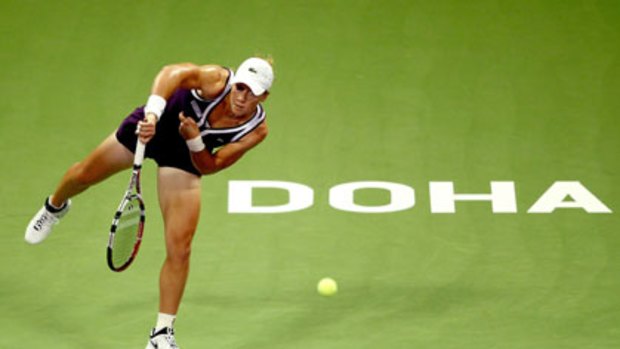 Sam Stosur serves during her three-set loss to Elena Dementieva.