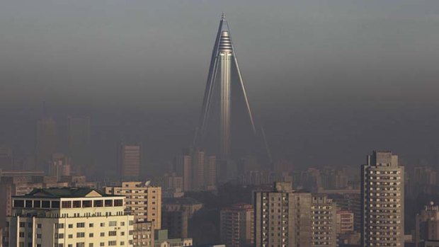 Decades to build ... the 105-storey Ryugyong hotel towers above other buildings in Pyongyang.