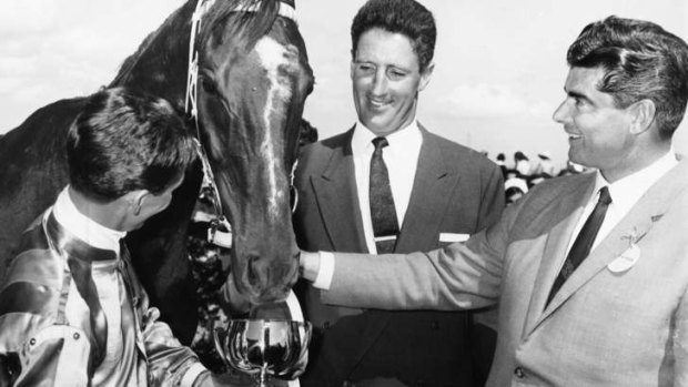 Cummings with great jockey Roy Higgins after winning his third Cup in a row, with Redhead, in 1967.