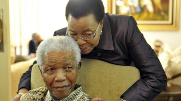 Former South African president Nelson Mandela with Graca Machel in 2011.