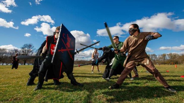 The Hundred Swords held a 'Boot Camp of Doom' training session on the lawns in front of the National Library.