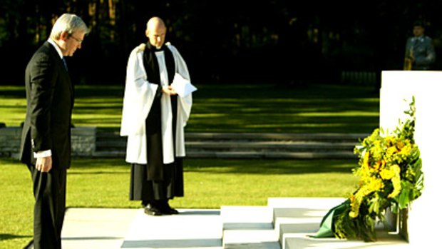 Prime Minister Kevin Rudd lay poppies on the graves of three young Australian airmen killed during their final tours of duty.