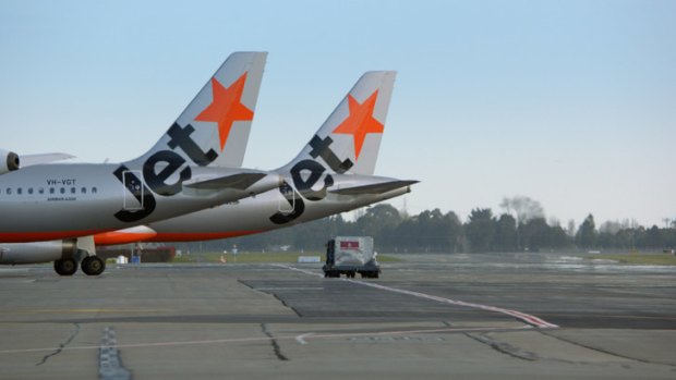 Grounded: Jetstar Airbus A320s are parked in Toulouse, France, for now.