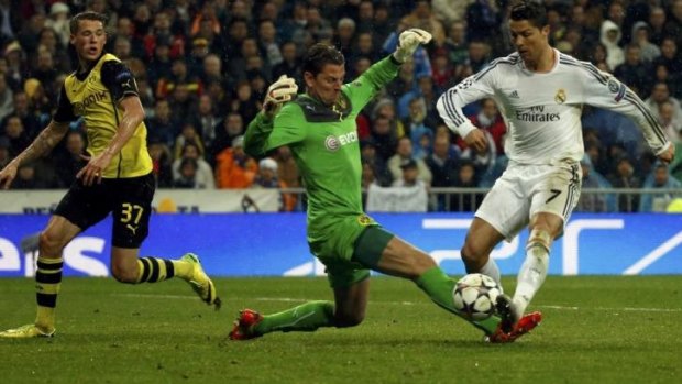 Sealed the deal: Ronaldo scores Real Madrid's third goal.