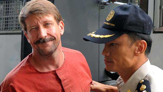Viktor Bout is escorted into a Bangkok court.