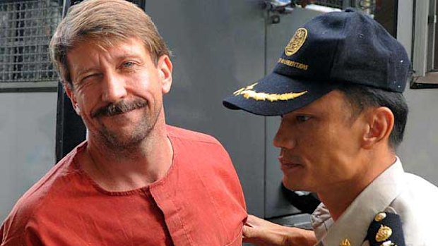 Viktor Bout is escorted into a Bangkok court.