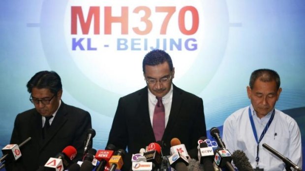 "Into thin air": Malaysian Defence Minister Hishammuddin Hussein (centre) at Thursday's news conference with with civil aviation chief  Azharuddin Abdul Rahman (left) and Malaysia Airlines chief executive Ahmad Jauhari Yahya.