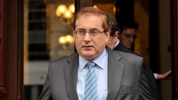 Former Securency executive David John Ellery leaves the Melbourne Supreme Court after pleading guilty to false accounting.