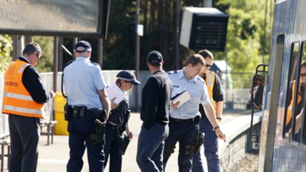 Police and Metro trains investigators at Tooronga station.