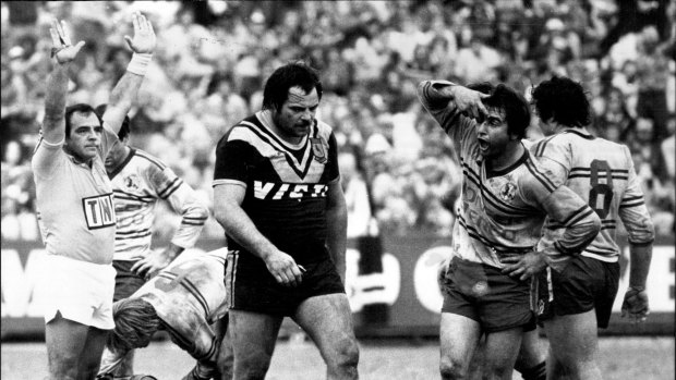 Cut from a different Sloth: Manly's Max Krilich gives Bruce Gibbs a gobful as the Wests prop is sent off at Brookvale Oval in 1980.