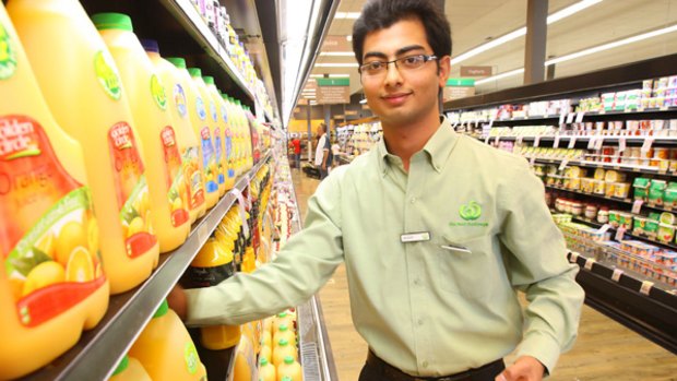 Happy camper: Mohit Mohit says he feels completely secure in his Woolworths job. The company has announced it will hire 7000 workers Australia-wide.