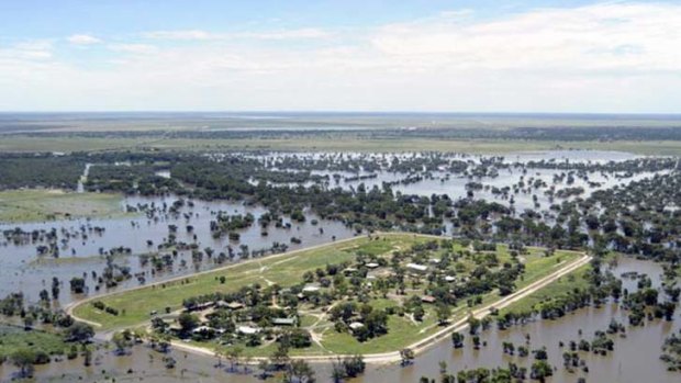 "After a flood, there is always hope" ... flood waters surround Alice Edwards Village on the western fringe of Bourke.
