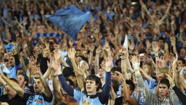 Vocal support ... Sydney FC fans in full voice after winning the 2010 A-League preliminary final against Wellington at the Sydney Football Stadium. More attention must be given to the fans, says Foster.