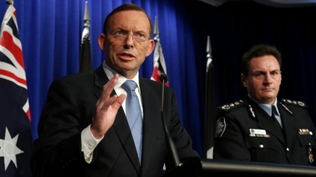 Prime Minister Tony Abbott and AFP Commissioner Tony Negus brief the media on the MH17 mission.